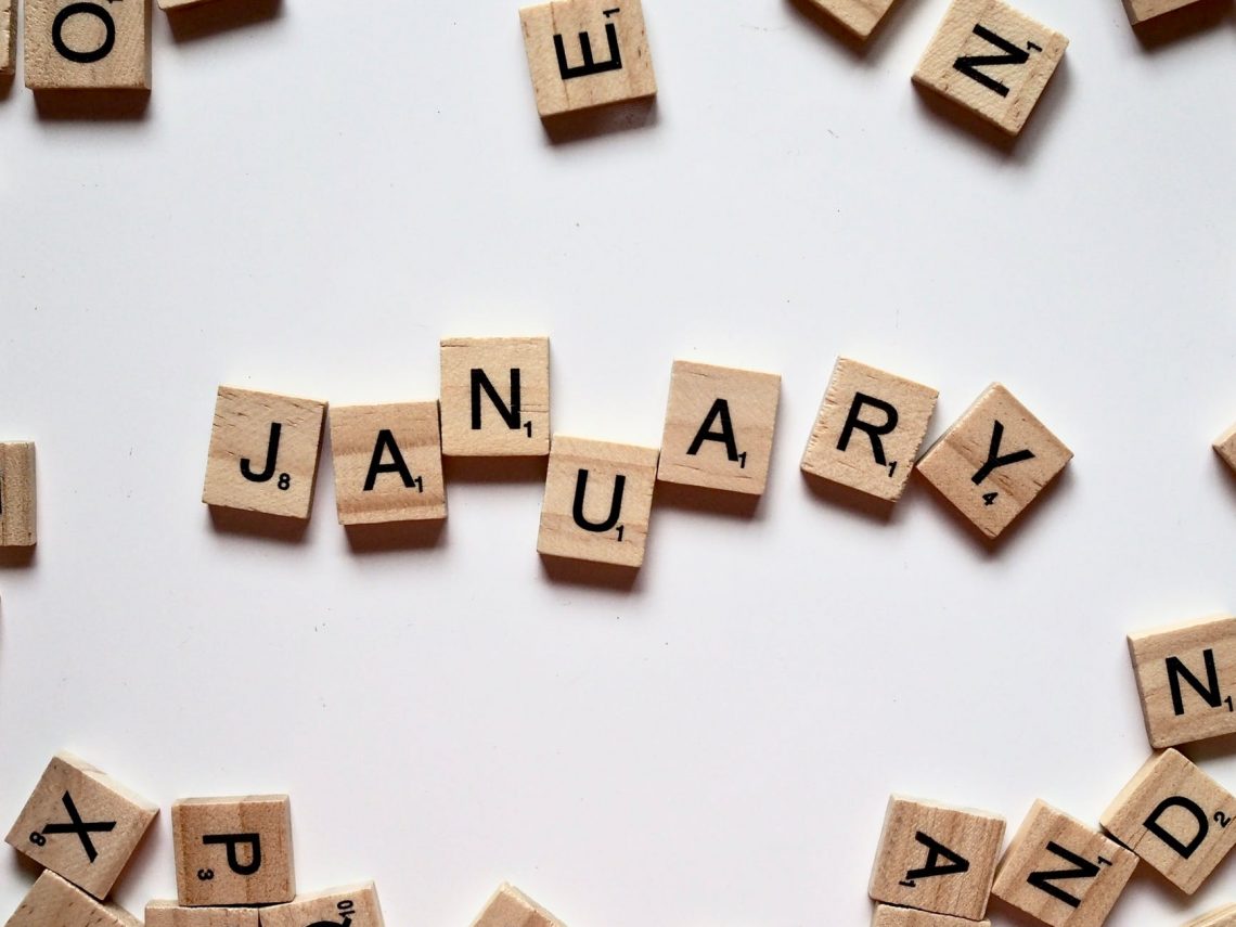January spelled out in Scrabble tiles